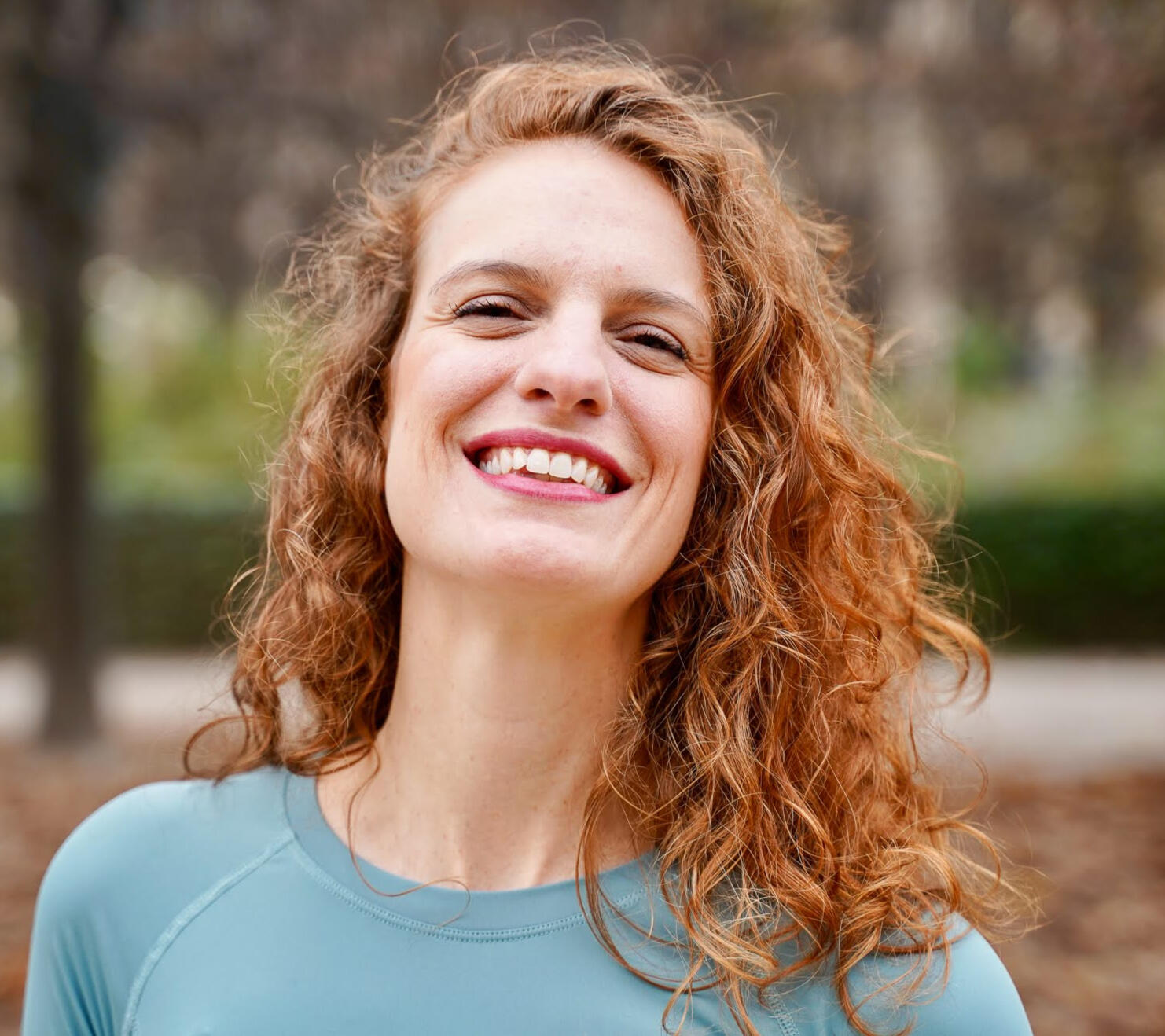 Camila Camila smiling outdoors